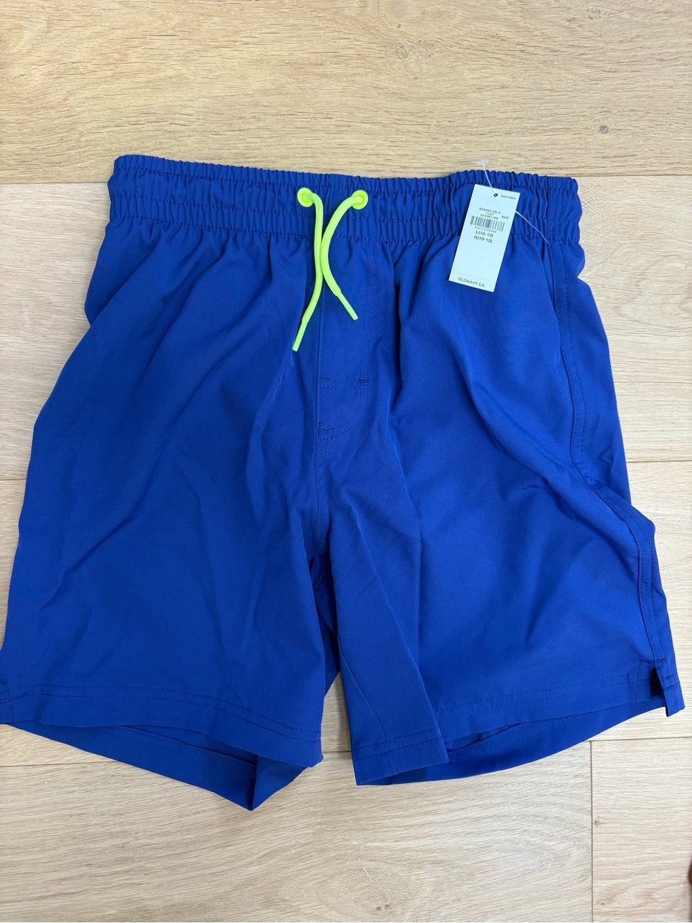Kid’s Blue Swim Trunks with Neon Drawcord size L (10-12)